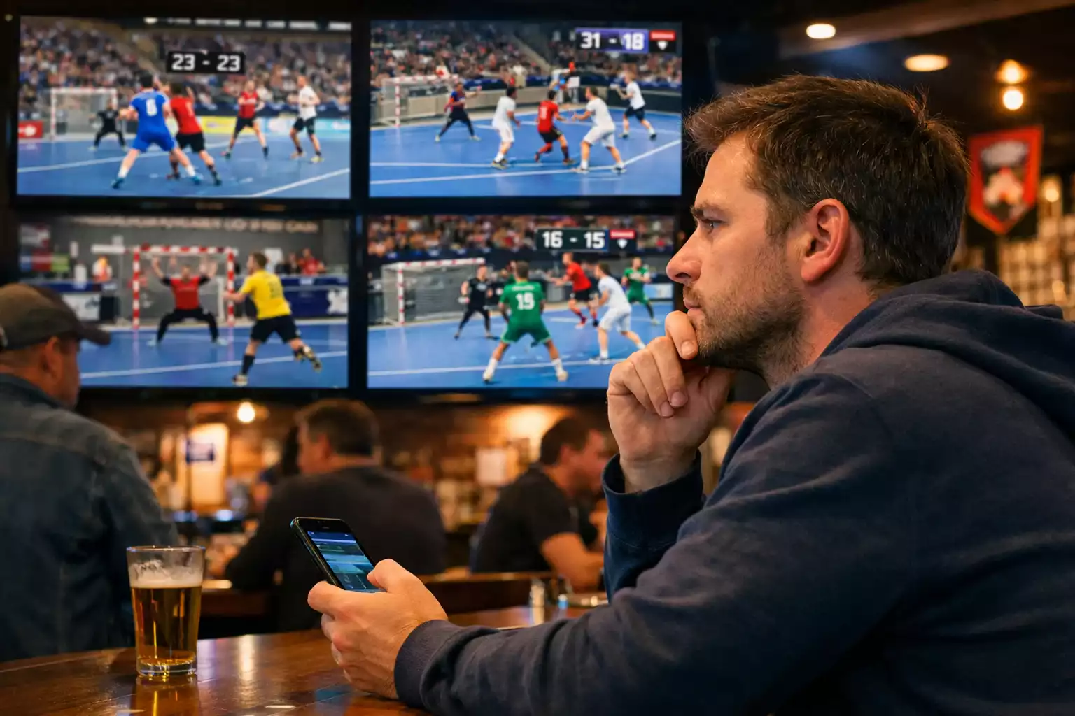 Person in Sportbar analysiert Handball-Spiele auf mehreren Bildschirmen für Wettentscheidung